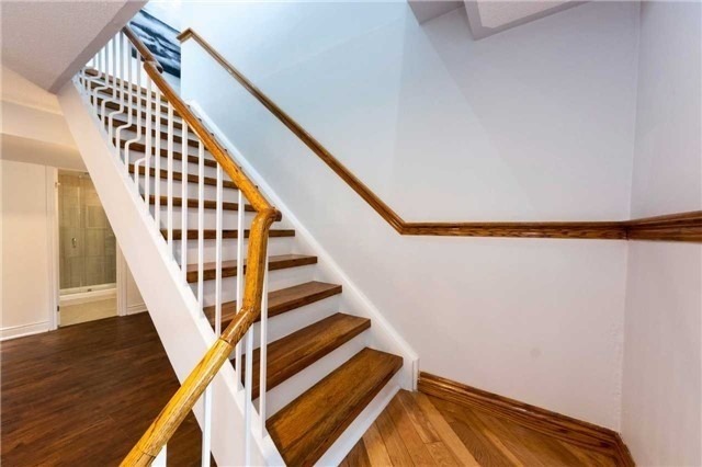 home renovation basement renovation oak stairs staircase railing white and brown hardwood